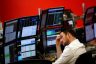 A market maker works on a trading floor in London.